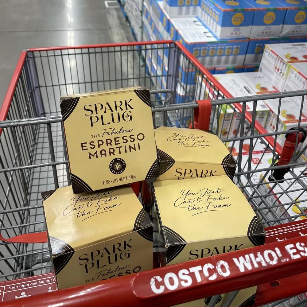 Spark Plug espresso martini 4-packs in a Costco shopping cart — #SparkMoments